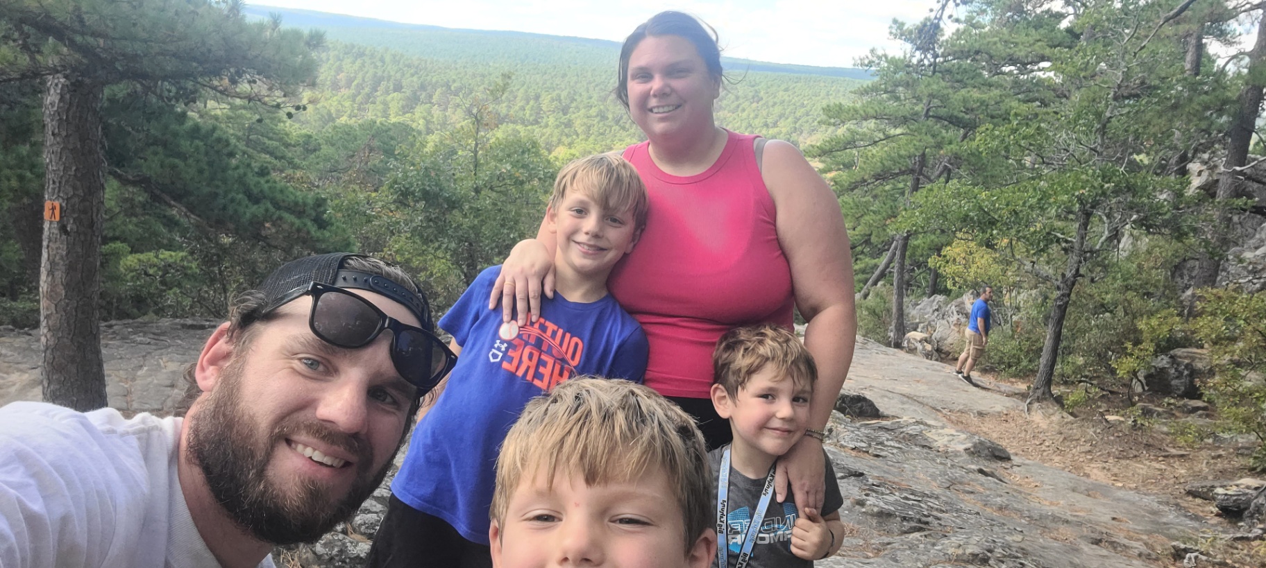 The Hopper family on a mountaintop overlook